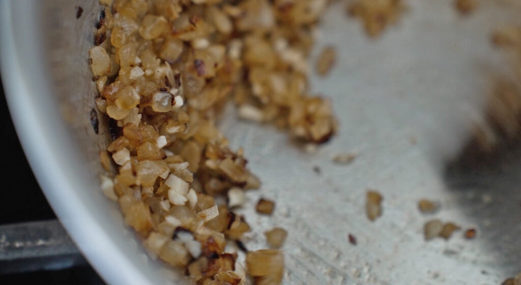 Browned onions with cumin and pepper flakes mixed in