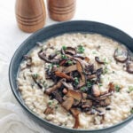 Mushroom risotto in a black bowl