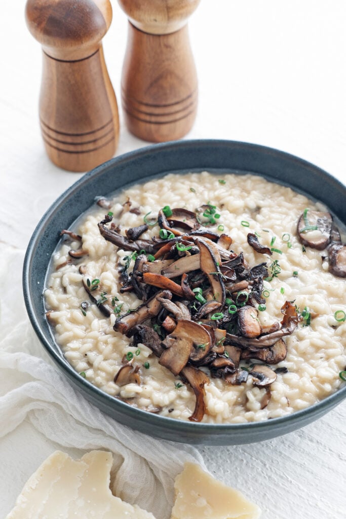 Mushroom risotto in a black bowl