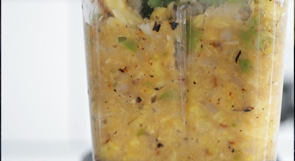 pineapple salsa blending in a blender