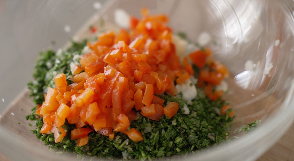 all of the finely chopped ingredients in one bowl