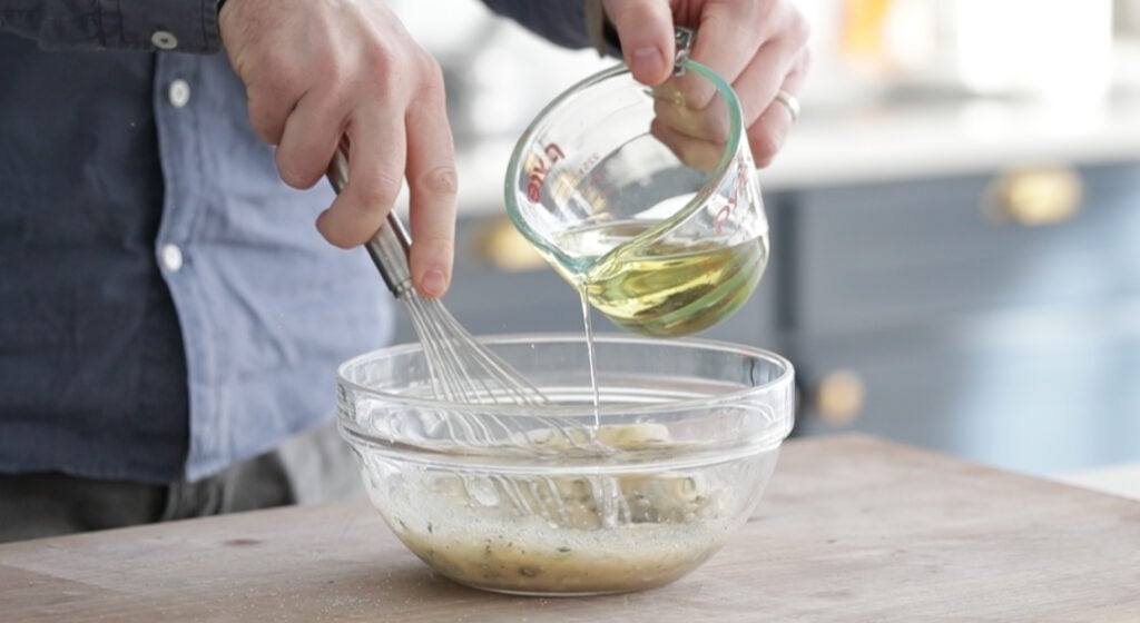 making the vinaigrette in a bowl