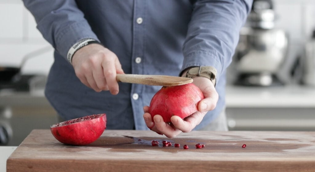 freeing the pomegranate seeds