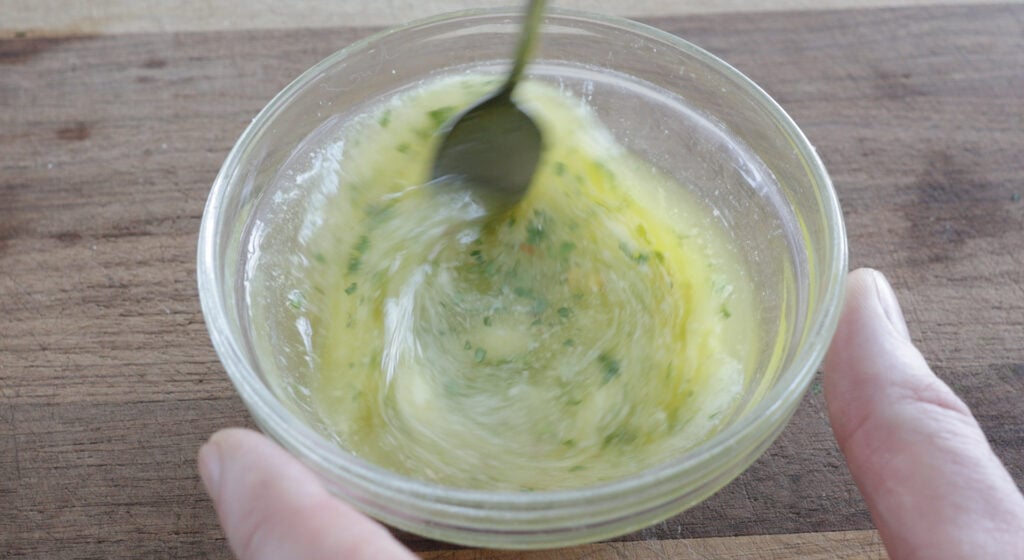 Mixing marinade with butter