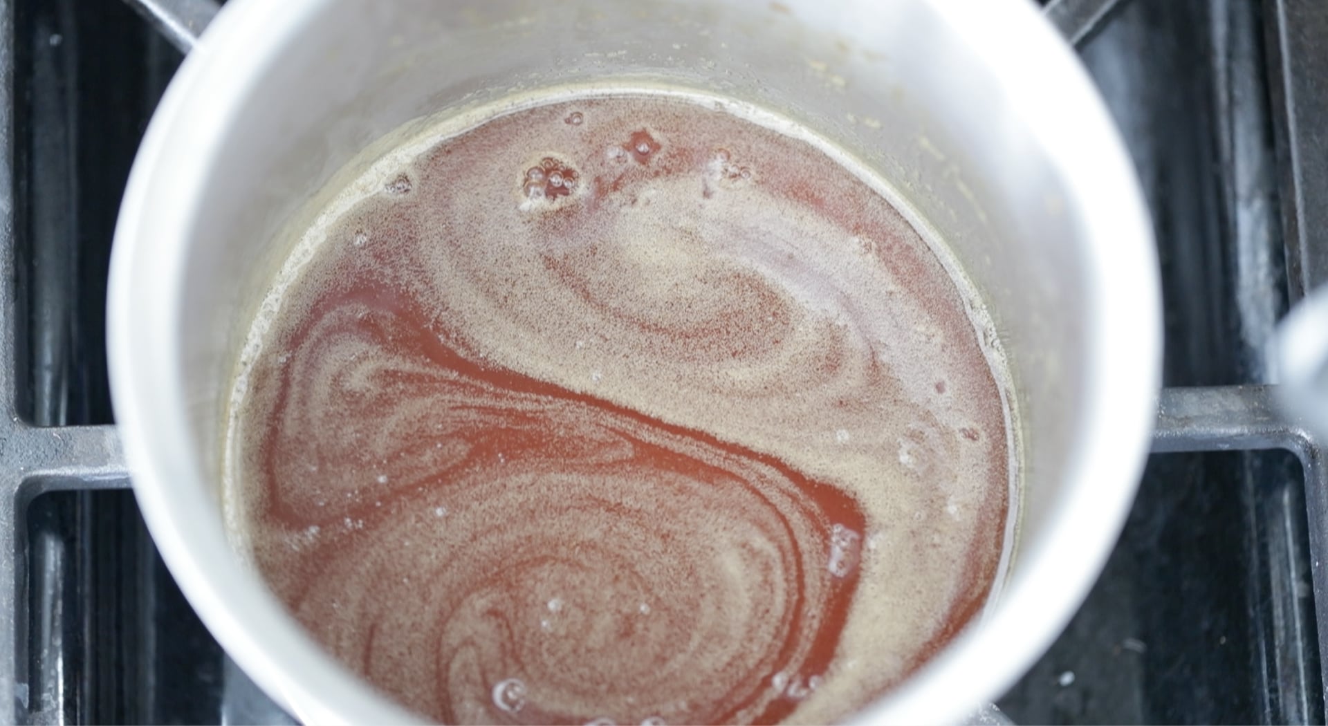 mixing a glaze in ap ot