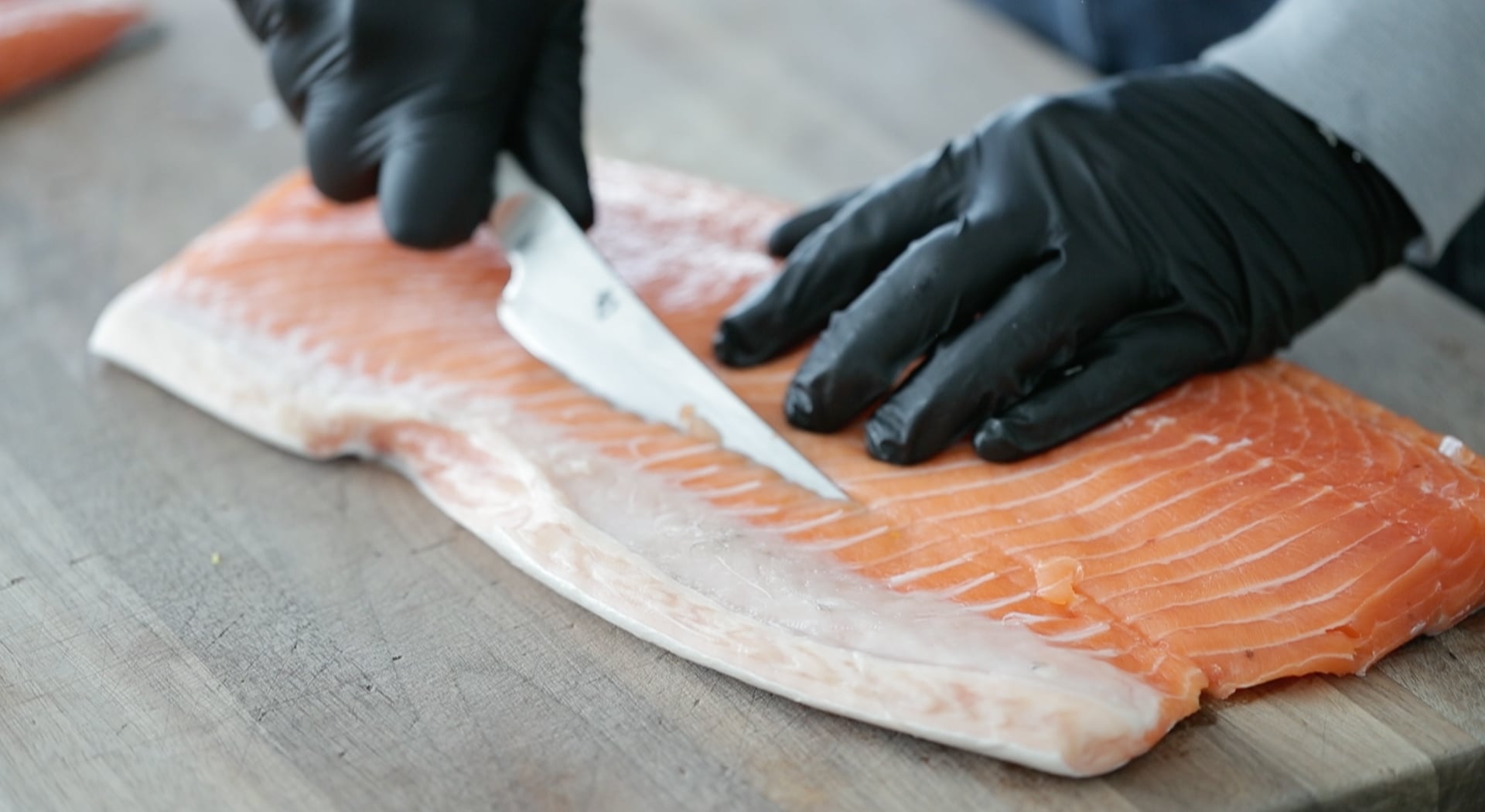 removing the belly from a salmon