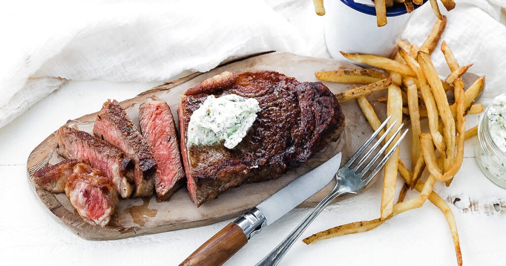 steak frites served on a plate