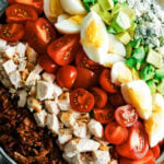 large cobb salad with bacon in a bowl