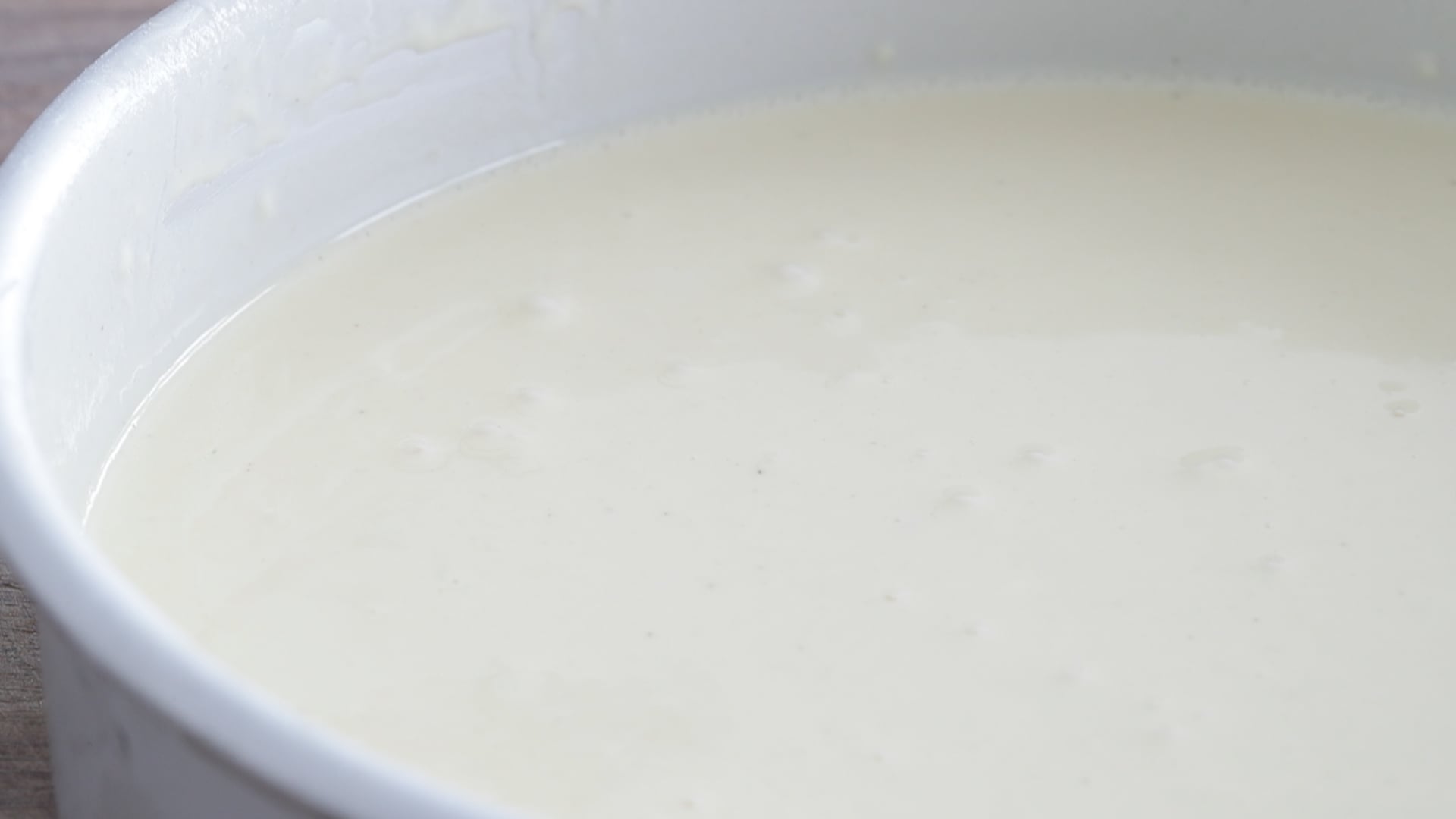 mixing together an egg wash