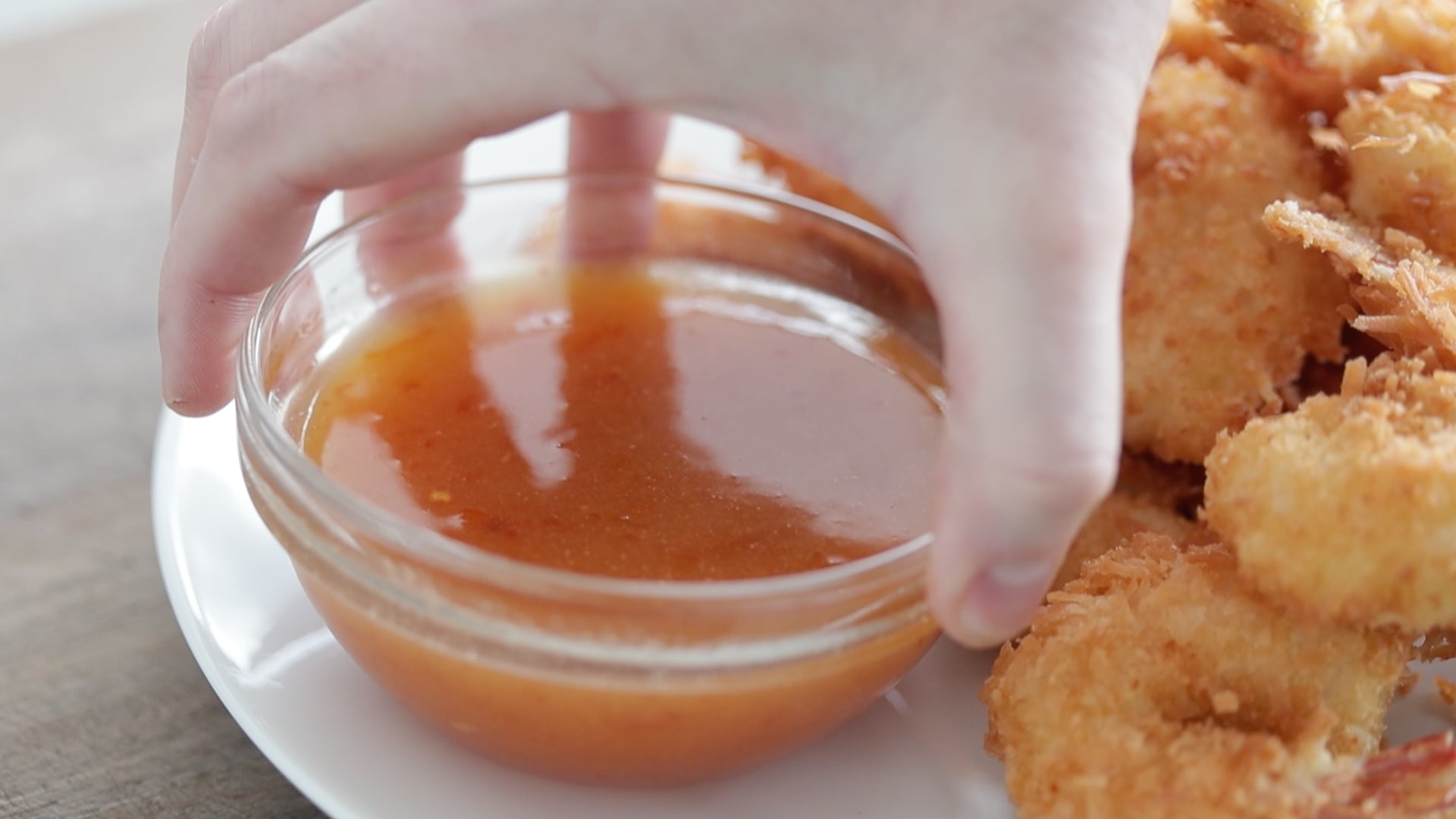 serving coconut shrimp with dipping sauce