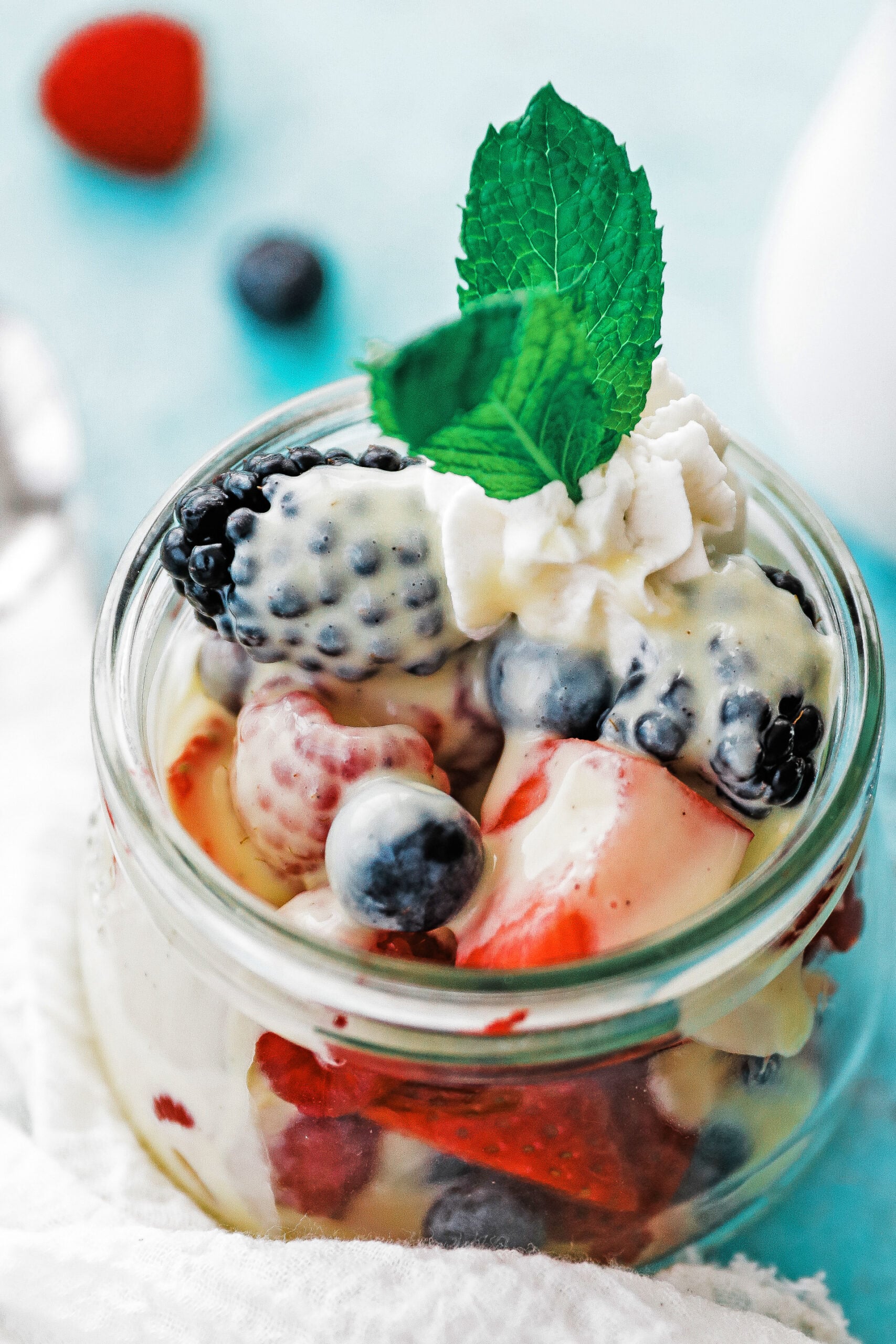 creme anglaise over berries