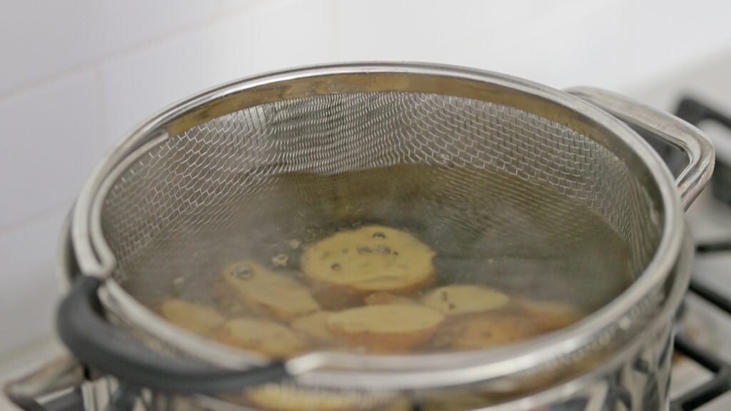 boiling sliced yukon potatoes