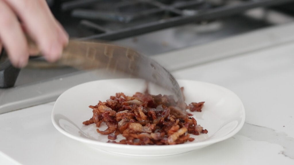 crisp bacon lardons on a plate