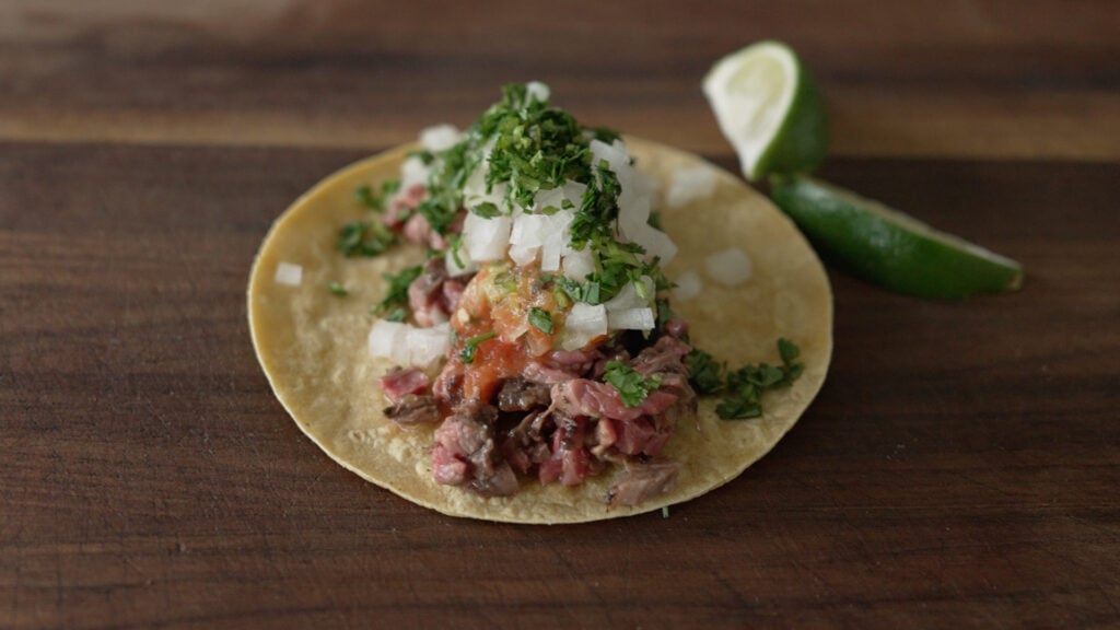 taco with all of the toppings added