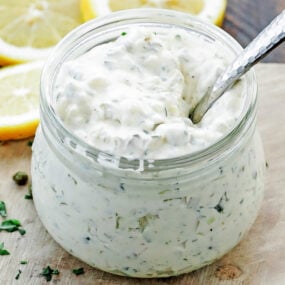 jar of homemade tartar sauce with a spoon
