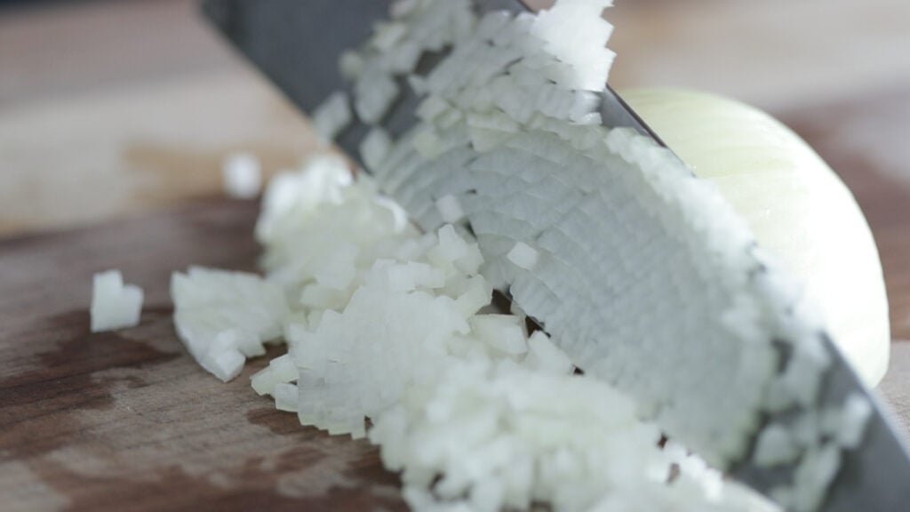 small dicing onions on a cutting board