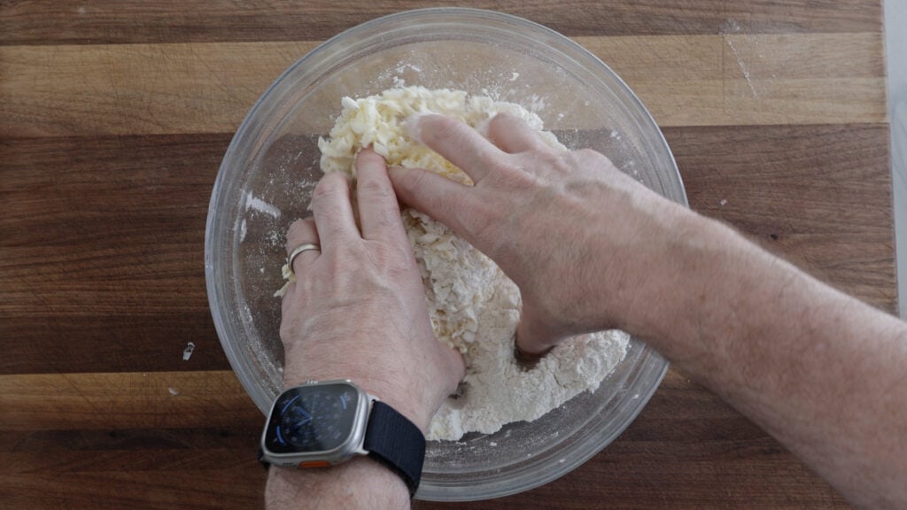 using handle to mix the topping ingredients