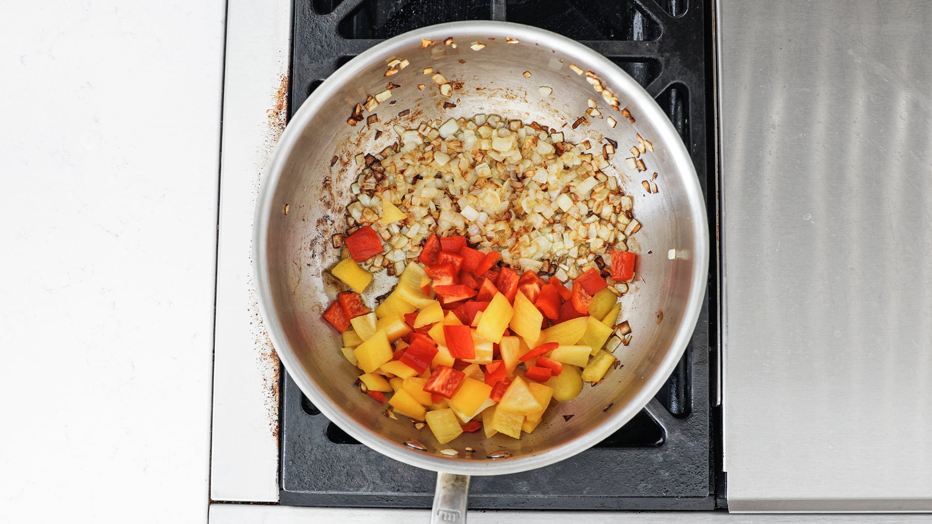 cooking onions and peppers