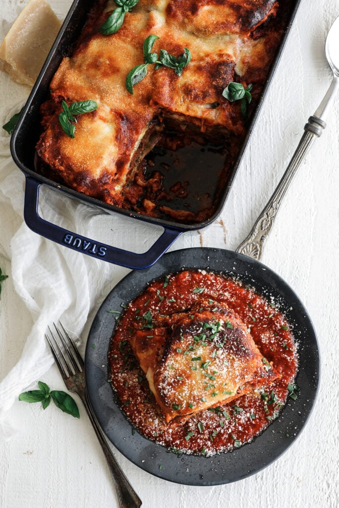 eggplant parmesan casserole and a served plate 