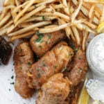 fish and chips with tartar sauce and lemon
