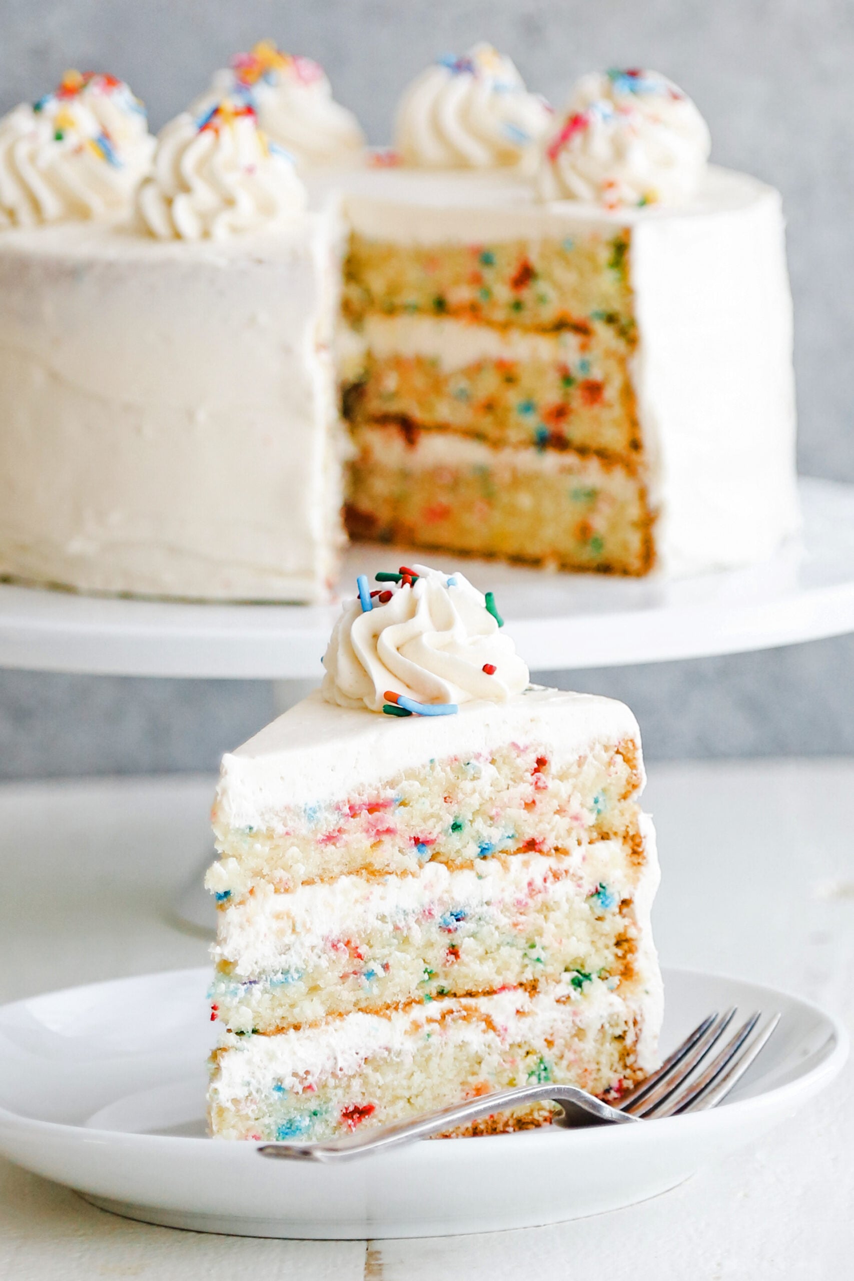 funfetti cake with a slice