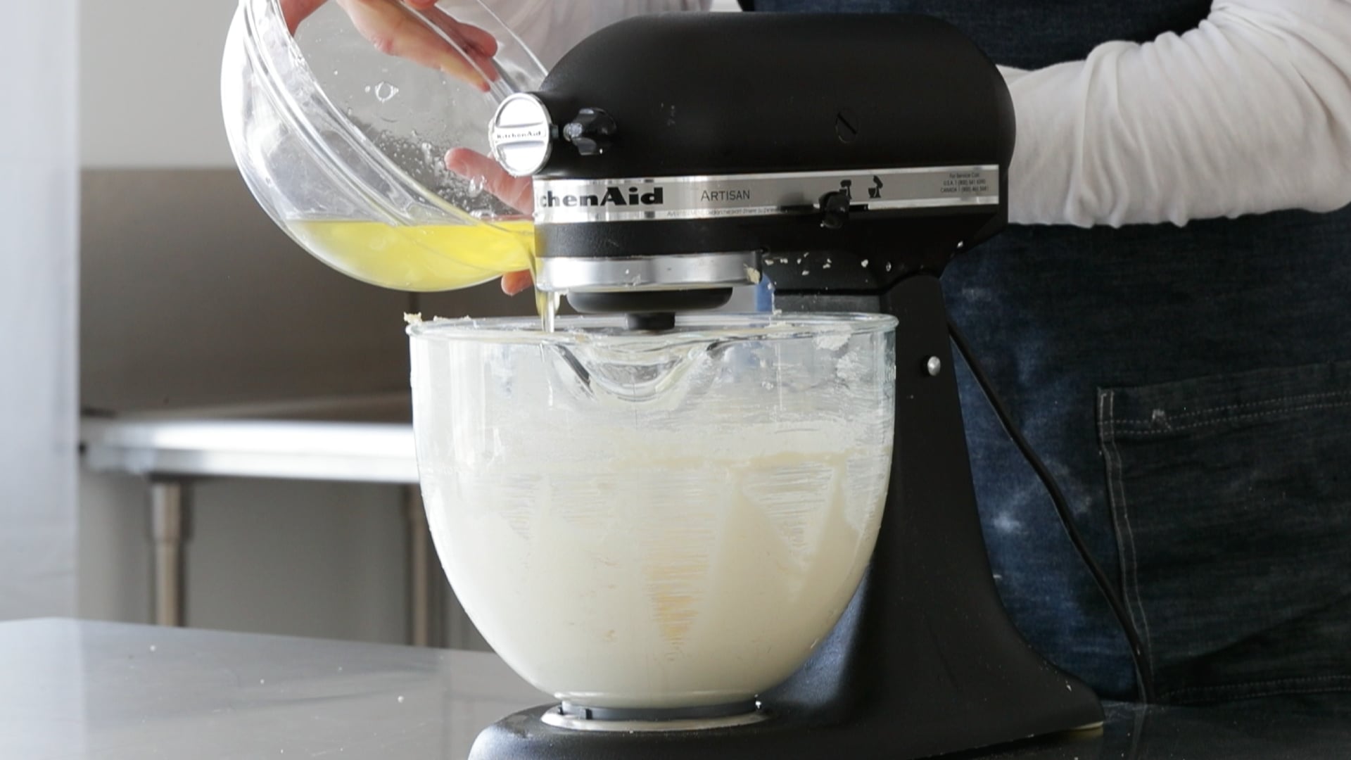 adding egg whites to a stand mixer