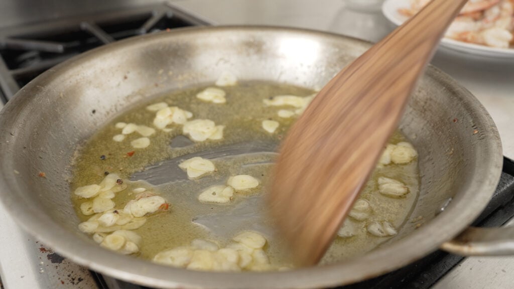 cooking garlic in a pan