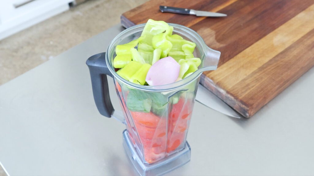 chopped vegetables in a blender