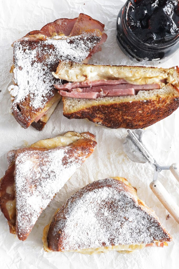 monte cristo sandwich in hand with jam