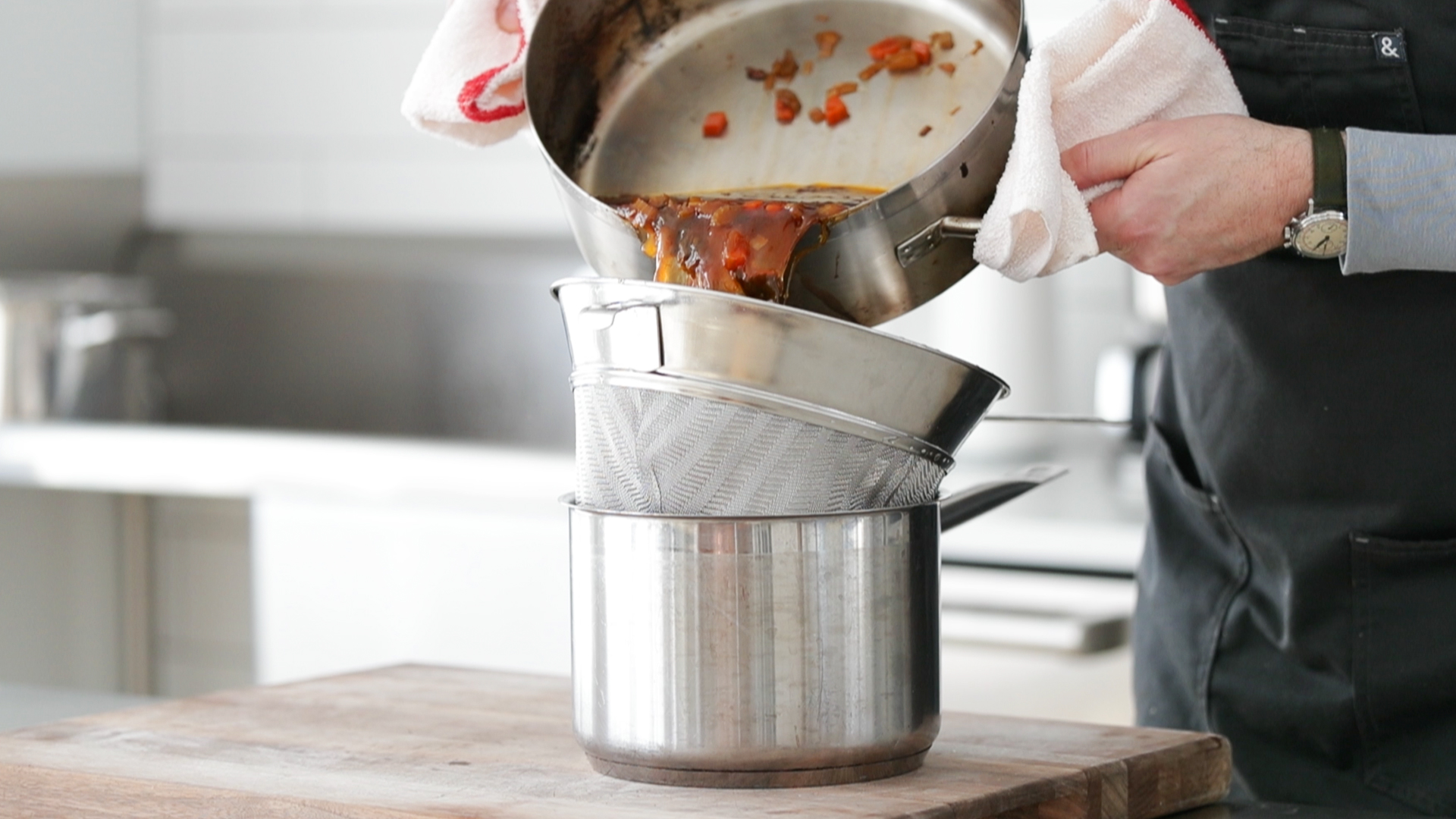 straining a beef stock