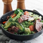 Thai Beef Salad in a black serving bowl