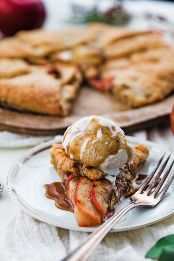 apple galette slice with ice cream and caramel