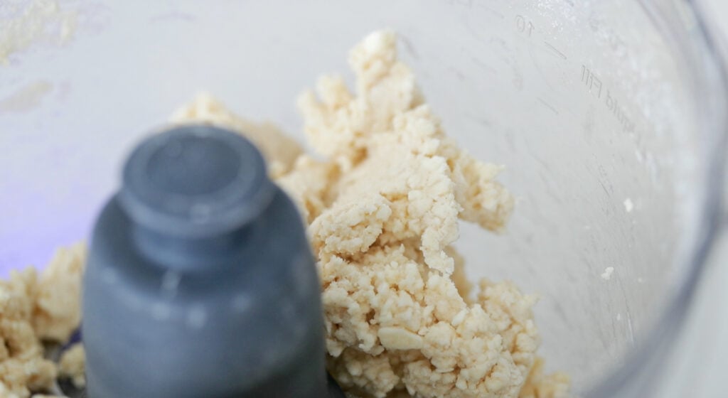 homemade pie dough in a food processor