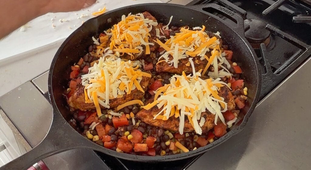 melting the cheese on top of each breasts