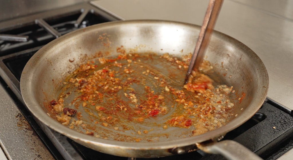 caramelizing the shallots and peppers