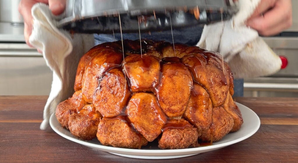 inverting the monkey bread onto a plate
