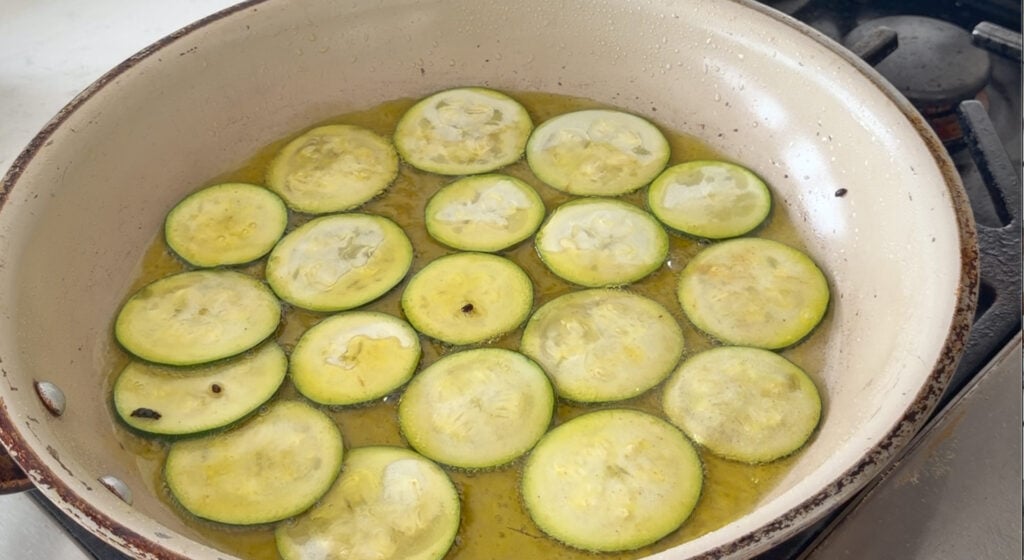 frying the zucchini in olive oil