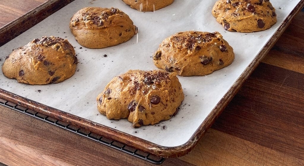 Pumpkin Chocolate Chip Cookies cooling on a baking pan