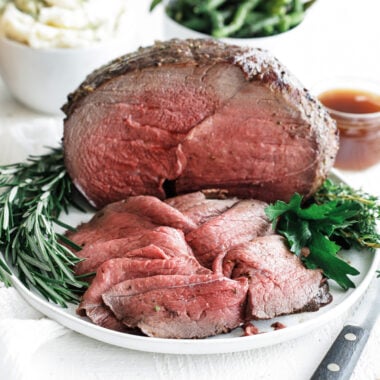 Sirloin Tip Roast served on a plate with herbs