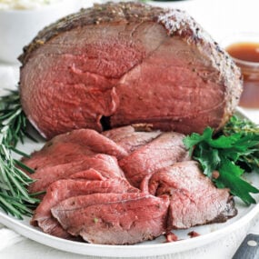 Sirloin Tip Roast served on a plate with herbs