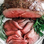 Sirloin Tip Roast served on a plate with herbs