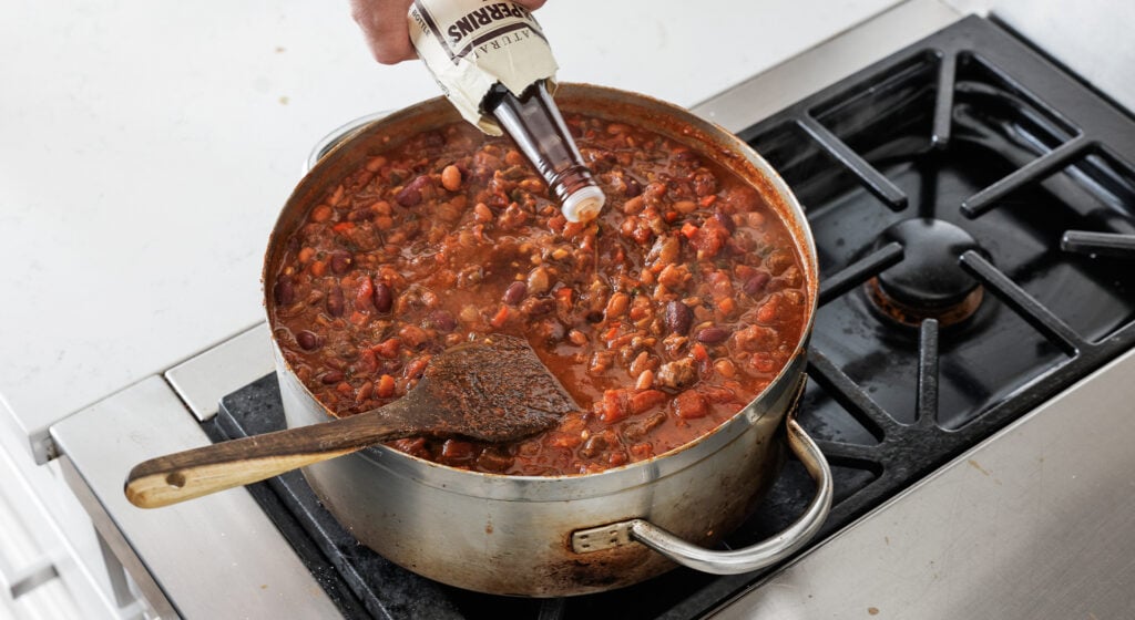 drizzling Worcestershire into the pot