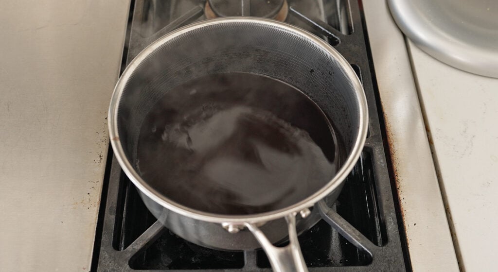 Reducing the wine and stock