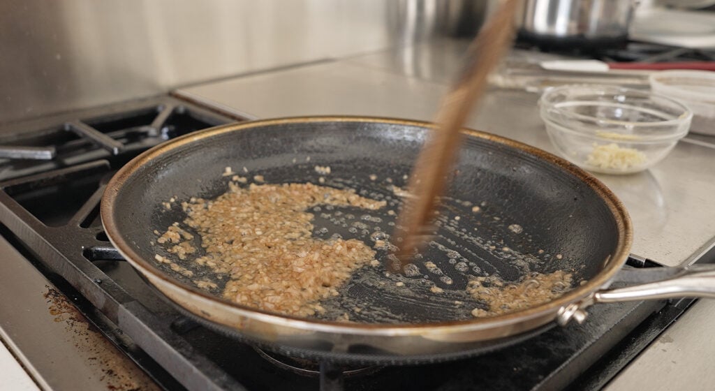 cooking the shallots for the sauce