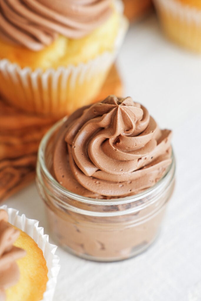 a jar of Chocolate Swiss Meringue Butter Cream 
