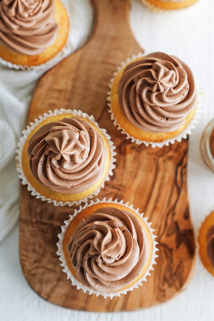 cupcakes with chocolate Swiss buttercream on top