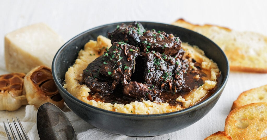 Finished peposo sauce reduced over polenta
