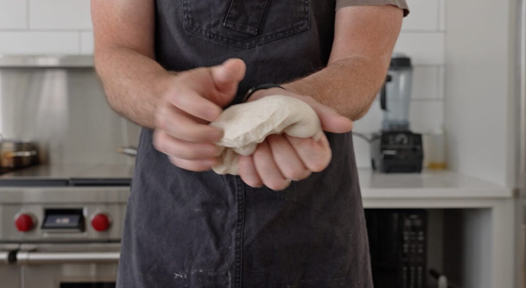 dividing the sour dough into balls