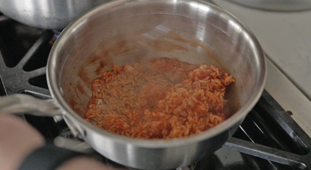 par-cooked rice in a pan